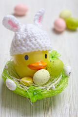 Easter decoration with little duck and eggs