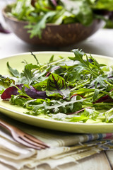 mixture of salad on a wooden background