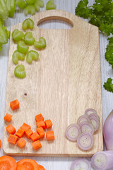 Top view on cutting board with vegetables