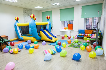 Interior of room, inflatable trampoline, kids birthday or party