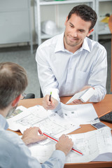 Fototapeta premium Architect sat with his colleague