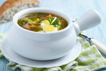 Sorrel soup with quail eggs