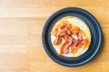 Eggs and bacon waffles