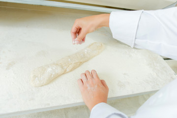 Preparing dough to be rolled
