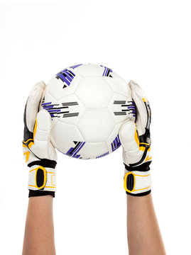 soccer goalkeeper with ball in his hand on white background