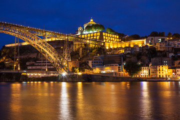 Fototapeta na wymiar Dom Luis I bridge over Douro river at night. Porto, Portugal