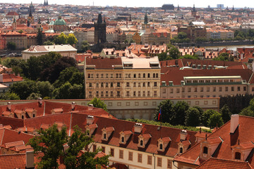 Fototapeta na wymiar Houses with traditional red roofs in Prague