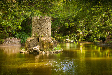 Fototapeta premium Fairytale pond in the park of Pena National Palace. Sintra