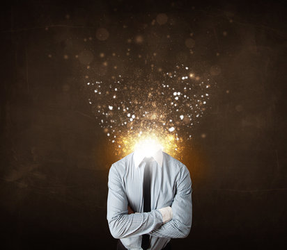 Business man with glowing exploding head