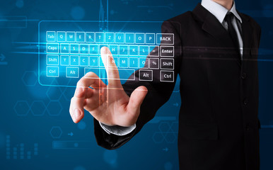 Businessman pressing virtual type of keyboard
