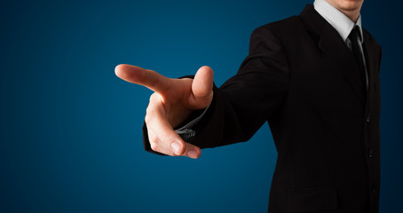 Businessman pressing imaginary button