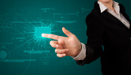 Woman pressing high tech type of modern buttons