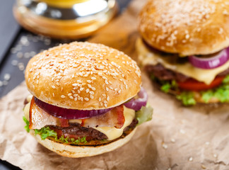 Delicious burger on wooden board