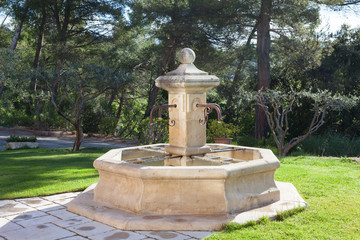 Typical stone fountain in Provence, France