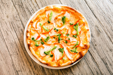 pizza on wooden background