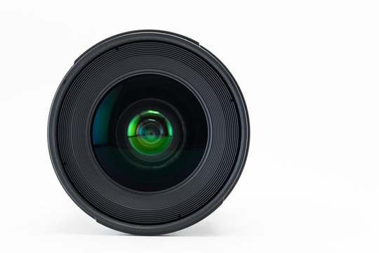 Front view of camera lens on white background