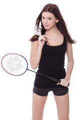 girl holding badminton racket and shuttlecock