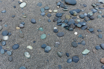 Fototapeta na wymiar Stone flint on the beach