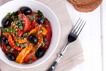 Hot salad from roasted sweet pepper
