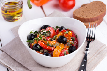 Hot salad from roasted sweet pepper