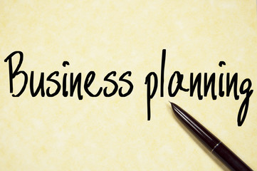 business planning text write on paper