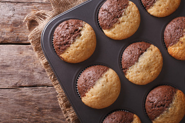 chocolate orange muffins in baking dish horizontal top view