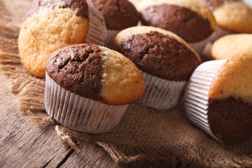chocolate orange muffin on the table close-up, horizontal