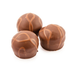 Three chocolates isolated on a white background