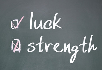 Obraz premium strength or luck determine
