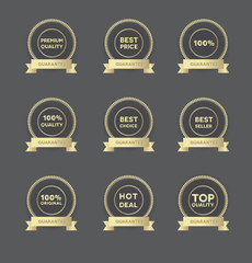 set of seller's golden hollow badges with golden ribbons