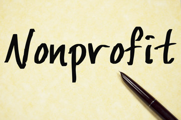 nonprofit word write on paper