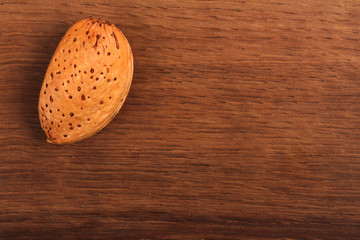 The Almond isolated on the wood