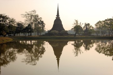 Fototapeta na wymiar Ancient stupa in Sukhothai Historical Park