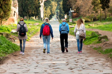 women walking in a park, ancient road