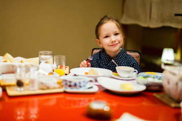 Little girl eating breakfast in Japan