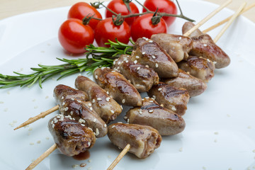 Grilled chicken hearts barbecue