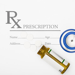 Prescription, pills and stethoscope - studio shot