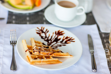 Delicious waffles with coffee