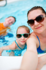 Fototapeta premium Mother and kids on vacation