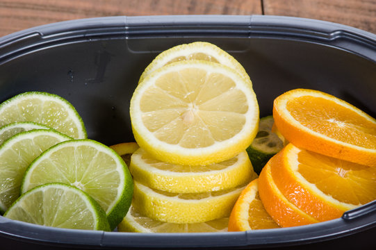 Bowl with lemon, lime and orange