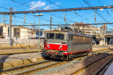 Fototapeta na wymiar Electric locomotive passing the Montpellier station - France