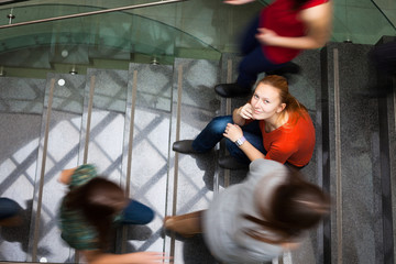 At the university/college - Students rushing up and down a busy