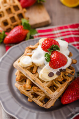 Belgian waffles with chocolate chips and fruits