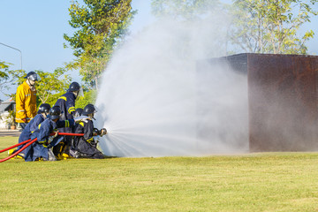 Firefighter fighting for fire attack training
