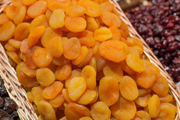 Dried apricot for sale at a market stall, La Boqueria Market