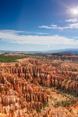 Rows of Brown and Yellow Sandstone Cliffs and Pinnacles in Bryce