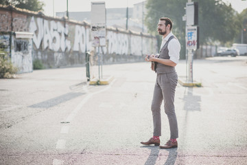 handsome big moustache hipster man playing mandolin