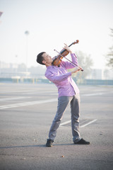 young crazy funny musician violinist asian man