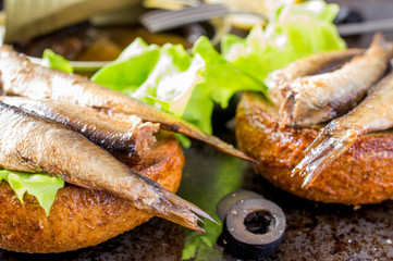 Burger with sardines