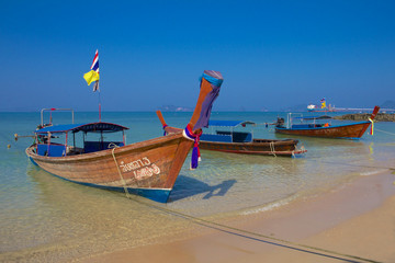 Fototapeta na wymiar Longtail boats docked in Krabi Thailand